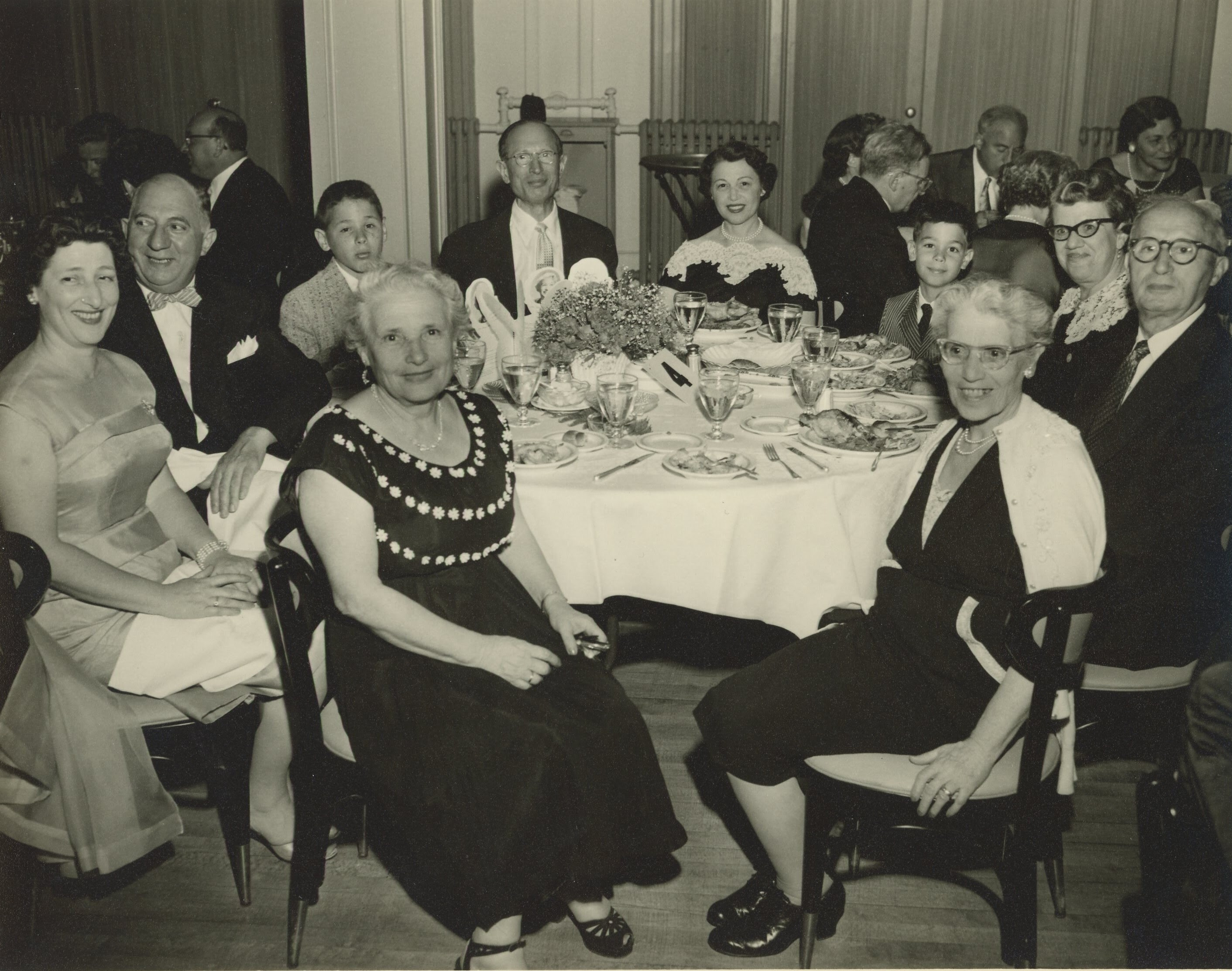 Pictured on the left in a family gathering are Estelle and Sidney Kaplan