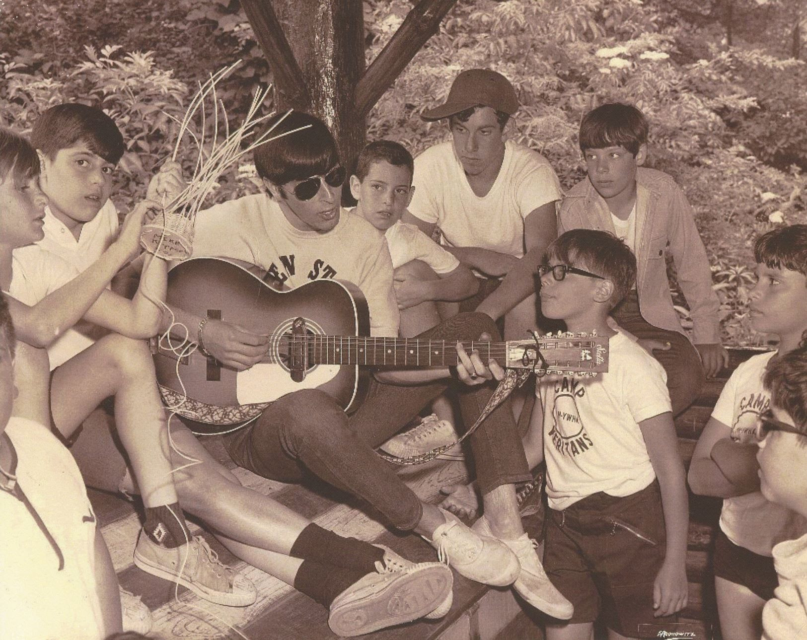 Camp Veritans, counselor David Fox, Alan Urdang, Glenn Foulds, Hal Kamine (by Fox's left shoulder), Larry Rosenblum (looking at camera)