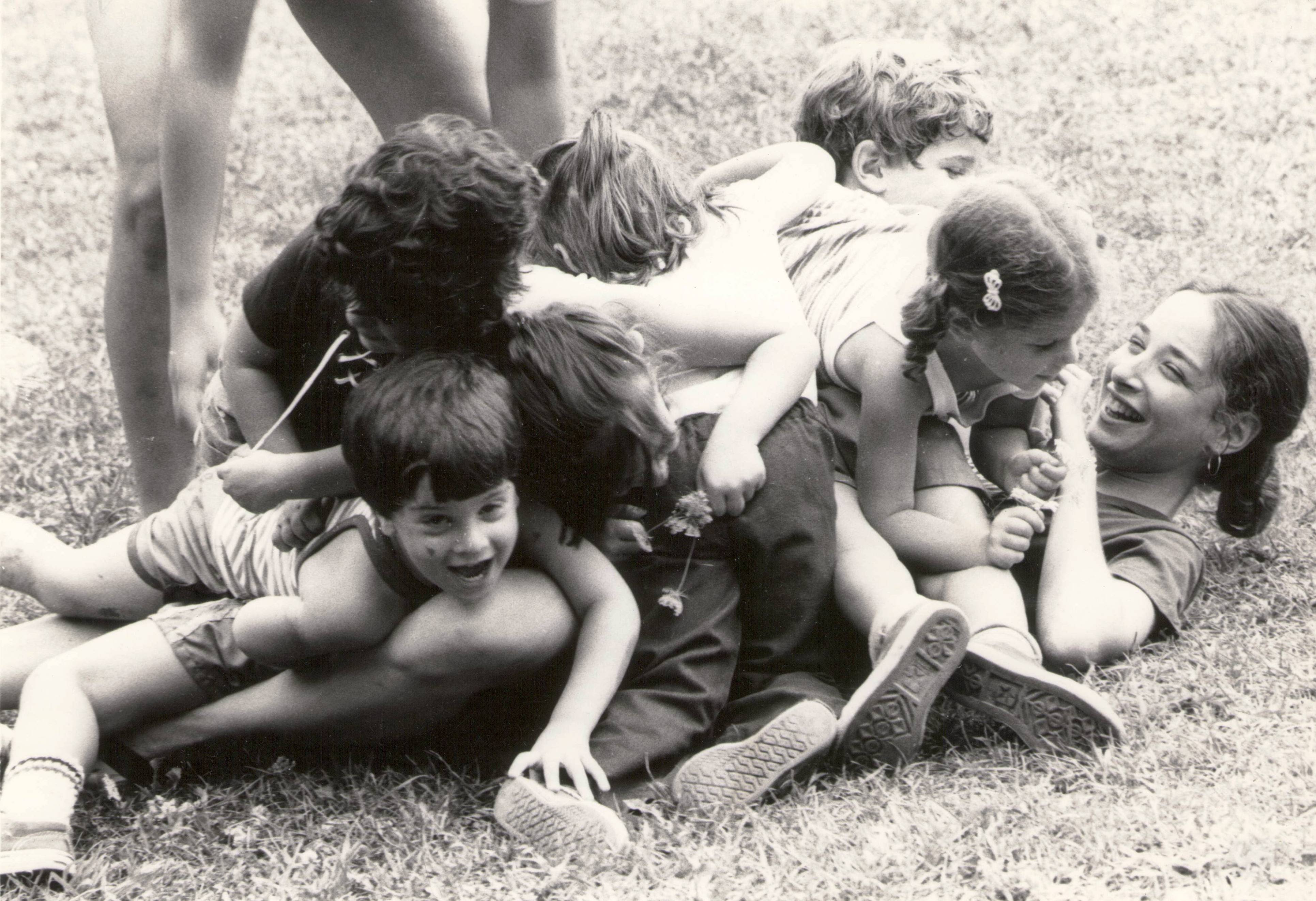 Game of "pile-up" on summer camp counselor.