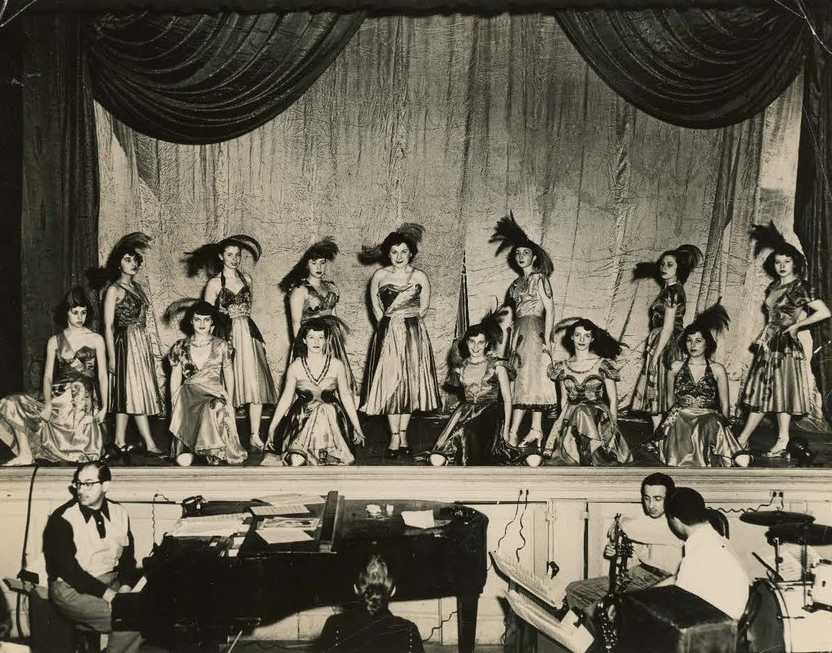 Panther Club show ladies in elaborate costumes
