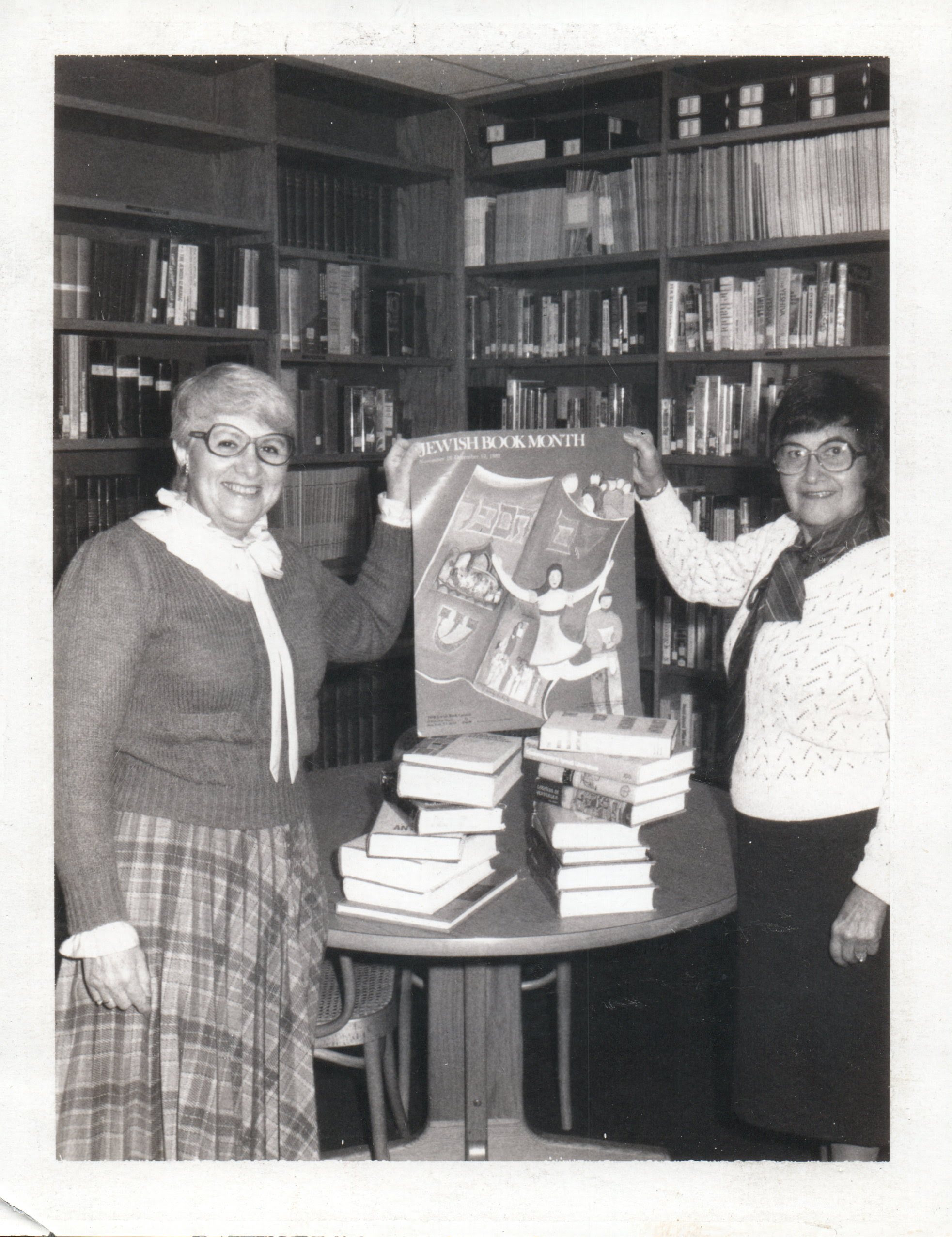 Sylvia Firschein with a library volunteer. 