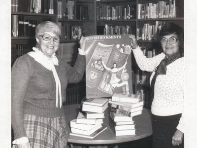 Sylvia Firschein with a library volunteer. 