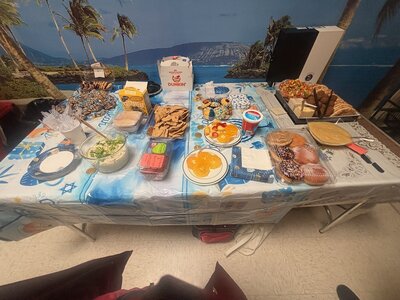 Chanukah celebration table of food Chanukah