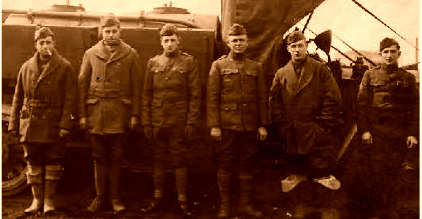 Patersonian Louis Jasper on the far left smoking a cigarette while he waits to be deployed overseas during WW1. . Photo was submitted by Lou Mechanic who is the grandson of Louis Jasper and a JHSNJ volunteer.